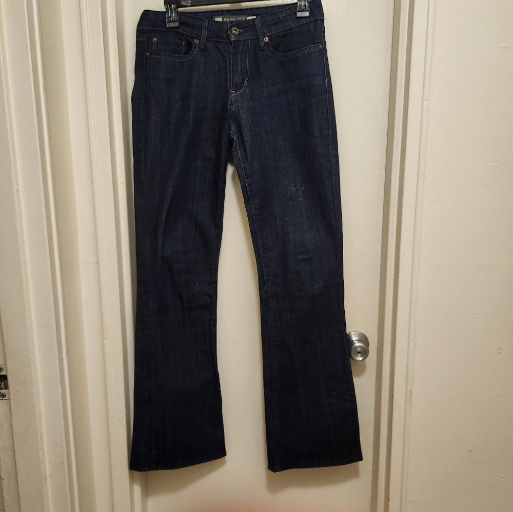 Levi's Slight Curve Classic Rise Boot Cut jeans. Size 27x32. Dark Wash.